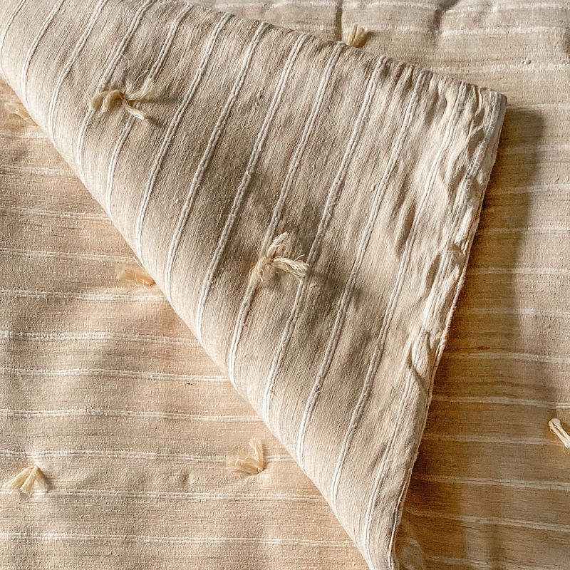 Sijua hand loomed natural silk with repeating ribbed texture
