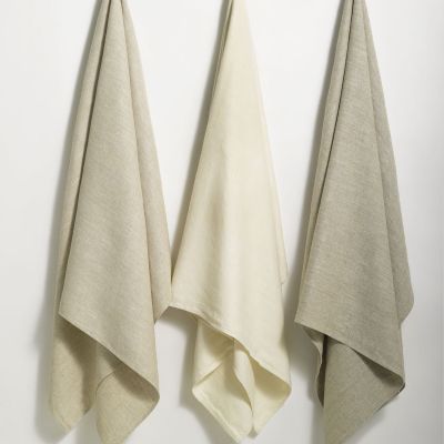 Donatas Modern, Eco friendly Linen Bath Towels hanging in three colors: natural, ivory, and beige