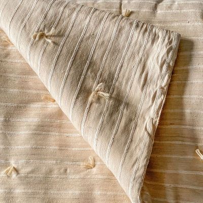 Sijua hand loomed natural silk with repeating ribbed texture
